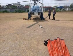 Helikopter Water Bombing Gempur Api TPA Putri Cempo